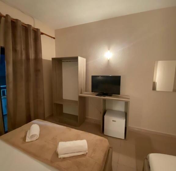 חדר סטנדרט לשלושה עם נוף לגינה, Seashell Beach Rooms