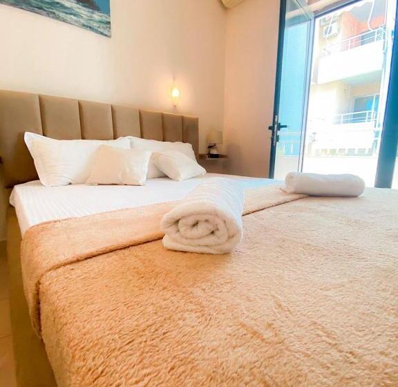 חדר סטנדרט לשלושה עם נוף לגינה, Seashell Beach Rooms