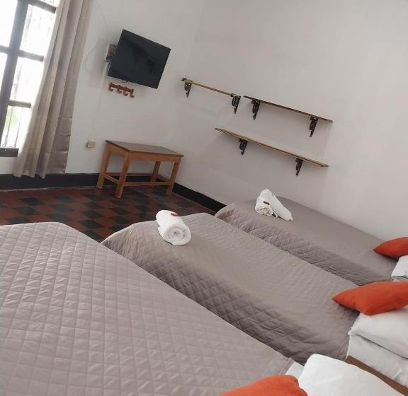 חדר לארבעה סטנדרטי עם נוף לגינה, Casa Alicia Mompox