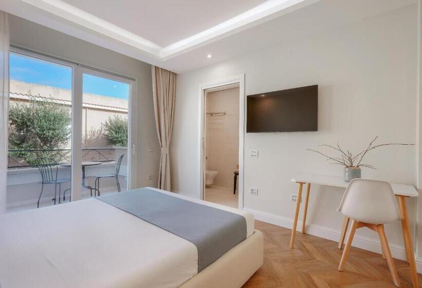 Quarto Estandar Cama King, Télos Rooms