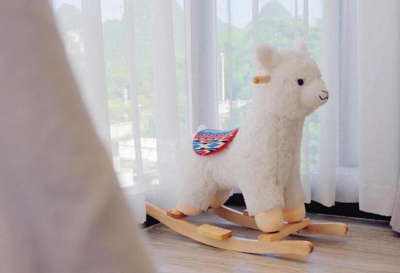 Aile Süiti, Ruoli Yangshuo