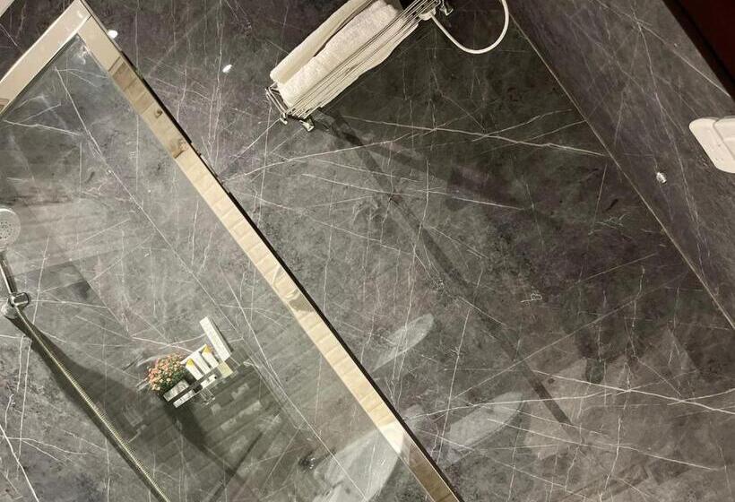 Suite Deluxe, فندق النزيل الذهبي   Golden Guest