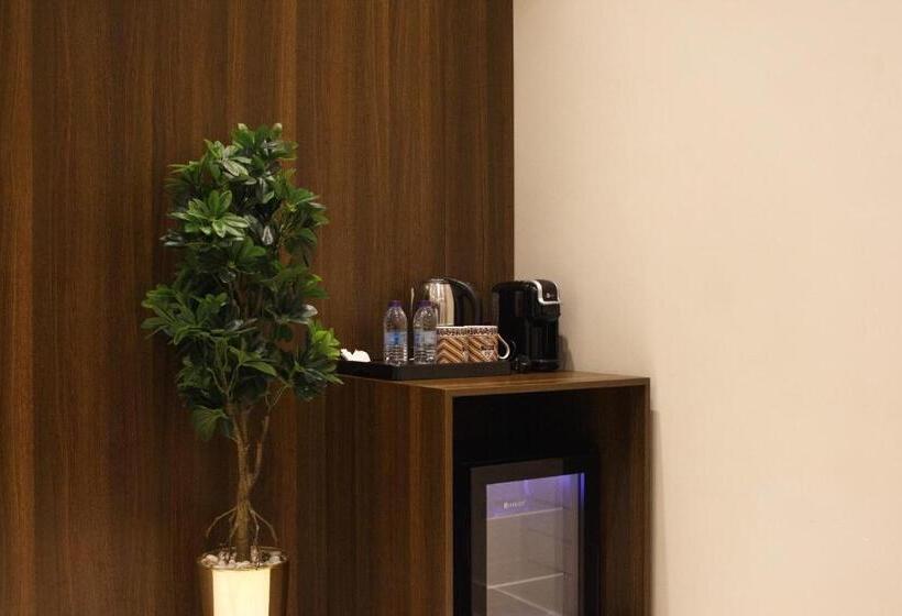 Suite Deluxe, فندق النزيل الذهبي   Golden Guest