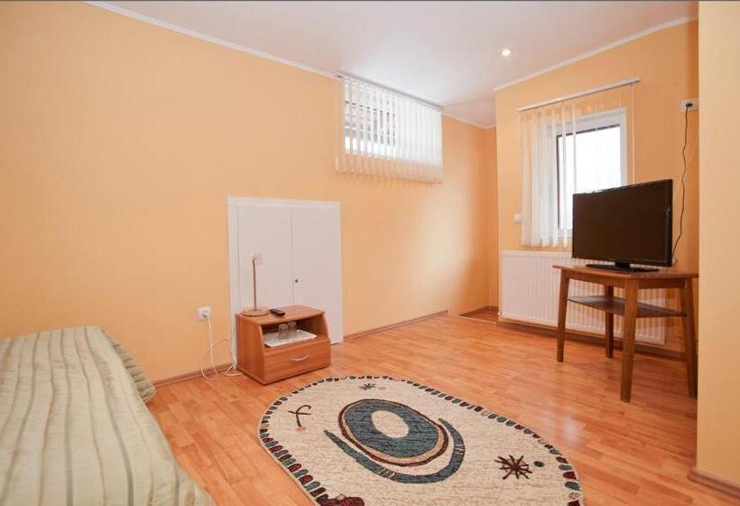 Quarto Estandar, Casa Tudor