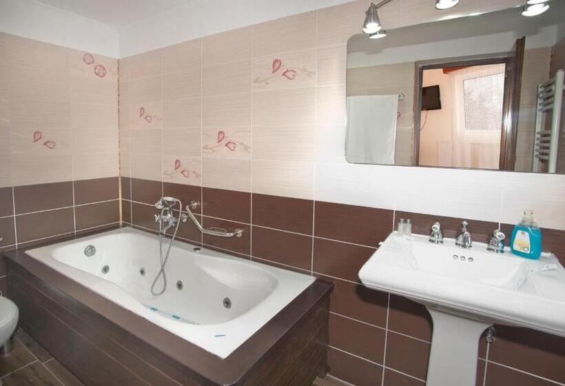 Quarto Deluxe, Casa Tudor