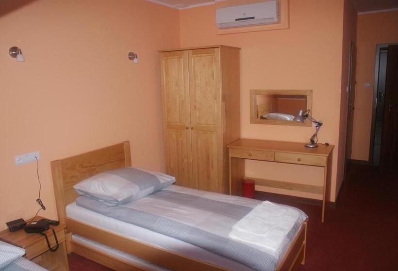 Номер Стандарт, U Hołosia