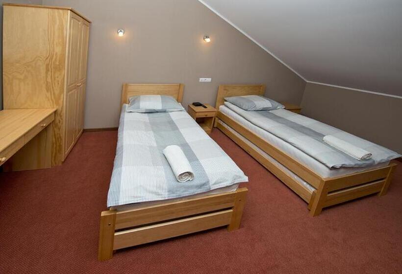 Номер Стандарт, U Hołosia