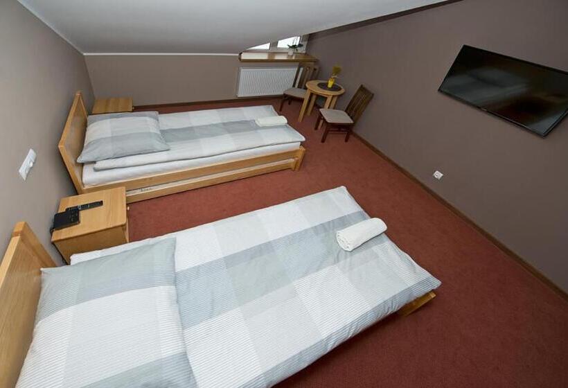 Номер Стандарт, U Hołosia