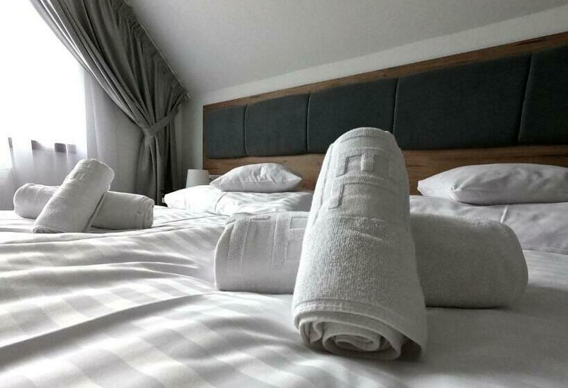 デラックスルーム, Tanzanit