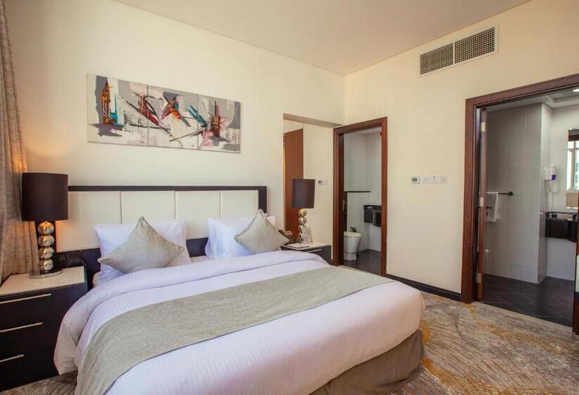 キングサイズベッドのデラックススイート, Grand Villaggio Hotel Abu Dhabi