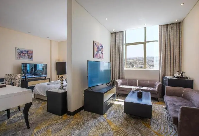 キングサイズベッドのデラックススイート, Grand Villaggio Hotel Abu Dhabi