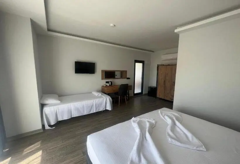 اتاق استاندارد سه تخته با چشم‌انداز باغ, Tolstoy Un Bisikleti Otel