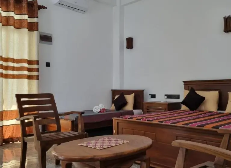 Perhehuone Merinäkymä, Dhammika Beach Palace