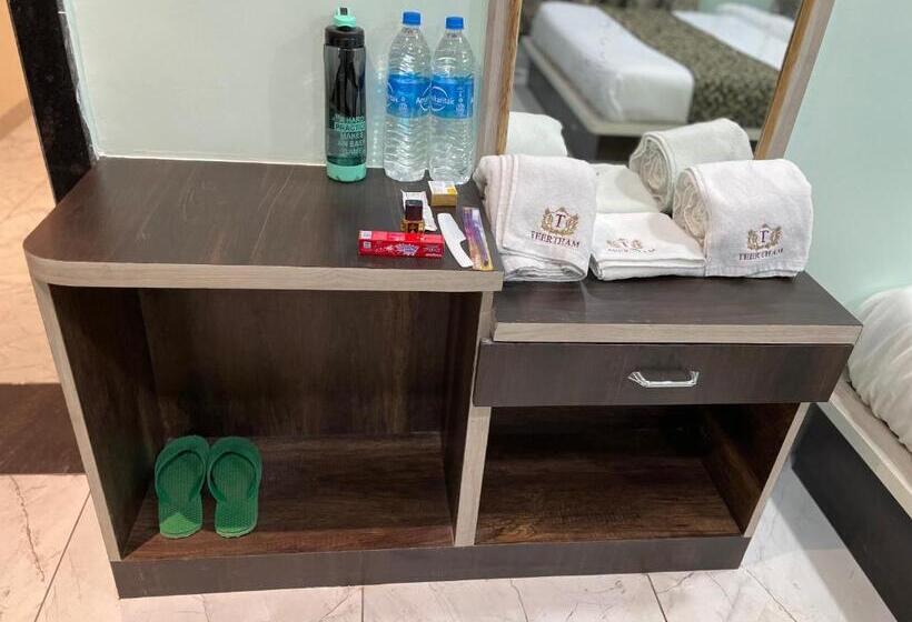 חדר משפחתי דלוקס, Teertham