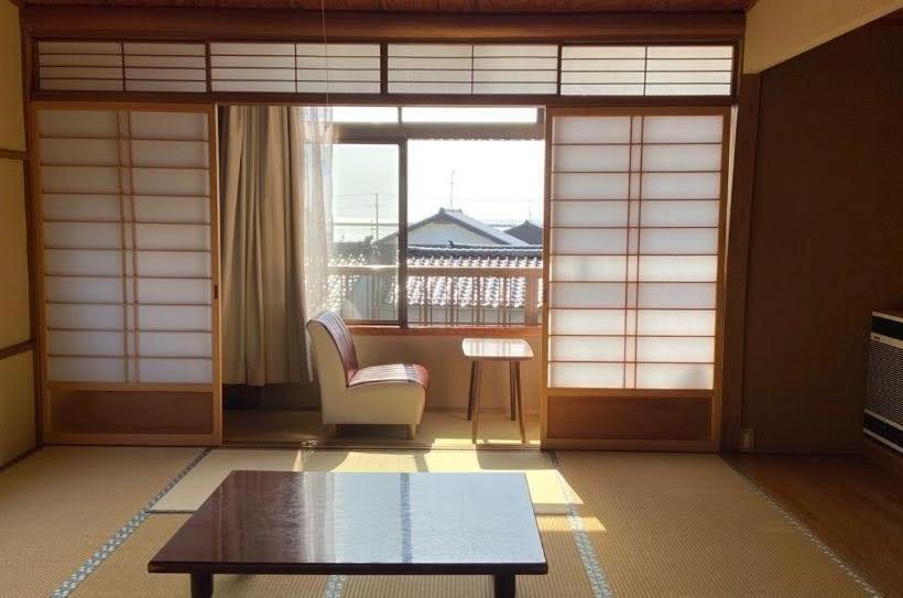 Chambre Quadruple Standard Salle de Bains Commune, ゲストハウス　華屋 (guest House Hanaya）
