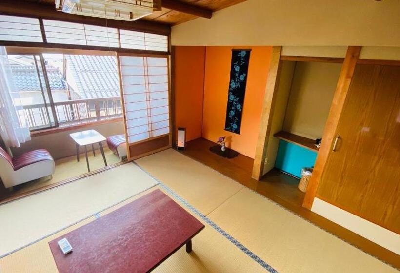 Chambre Quadruple Standard Salle de Bains Commune, ゲストハウス　華屋 (guest House Hanaya）