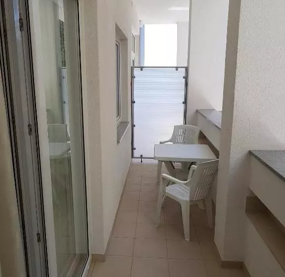 Standard Quadruple Room with Balcony