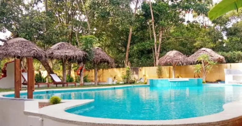 Standard Neljän Hengen Huone Puutarhanäkymä, Marari Beach Bungalow Resort Alleppey