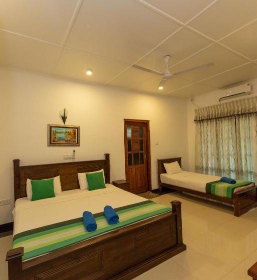 Habitació Triple Deluxe, Avon Villa