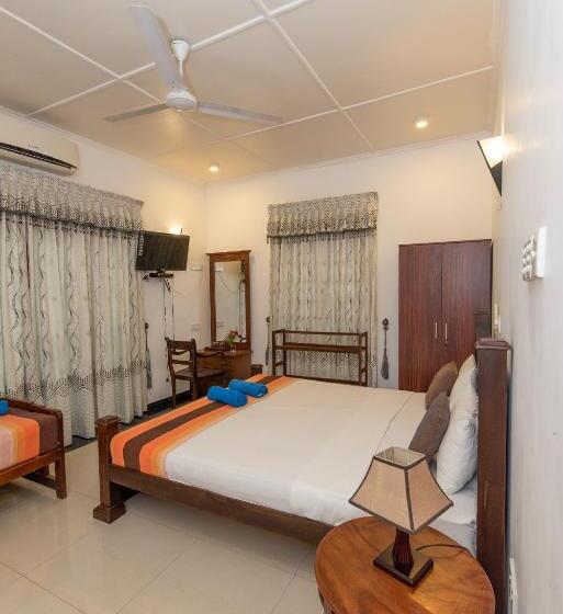 Habitació Triple Deluxe, Avon Villa