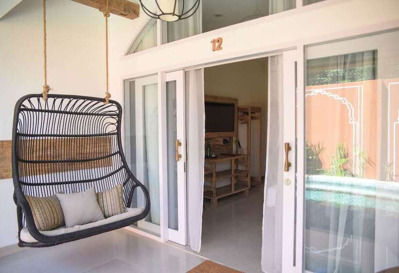 キングサイズベッドのスタンダードルーム, Pesona Beach Resort & Spa