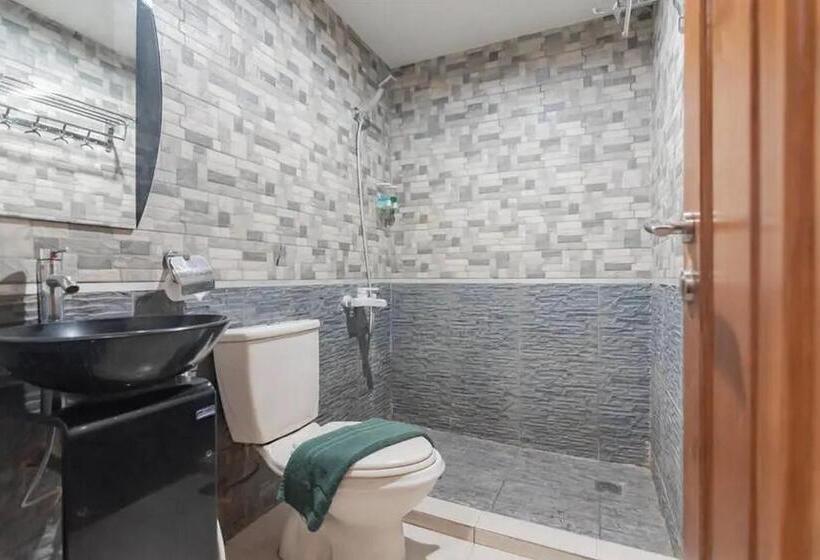 Quarto Deluxe, Reddoorz At Arwiga