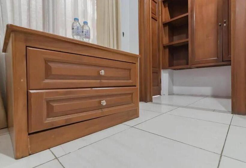 Quarto Deluxe, Reddoorz At Arwiga