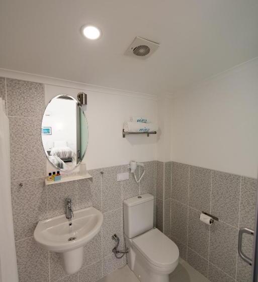 غرفة عائلية, Minu