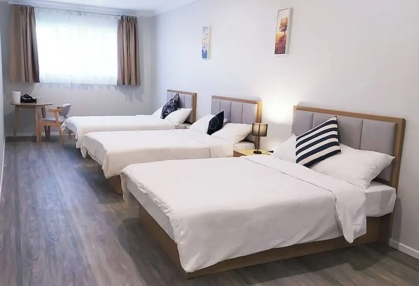 Deluxe Kolmen Hengen Huone, Awa