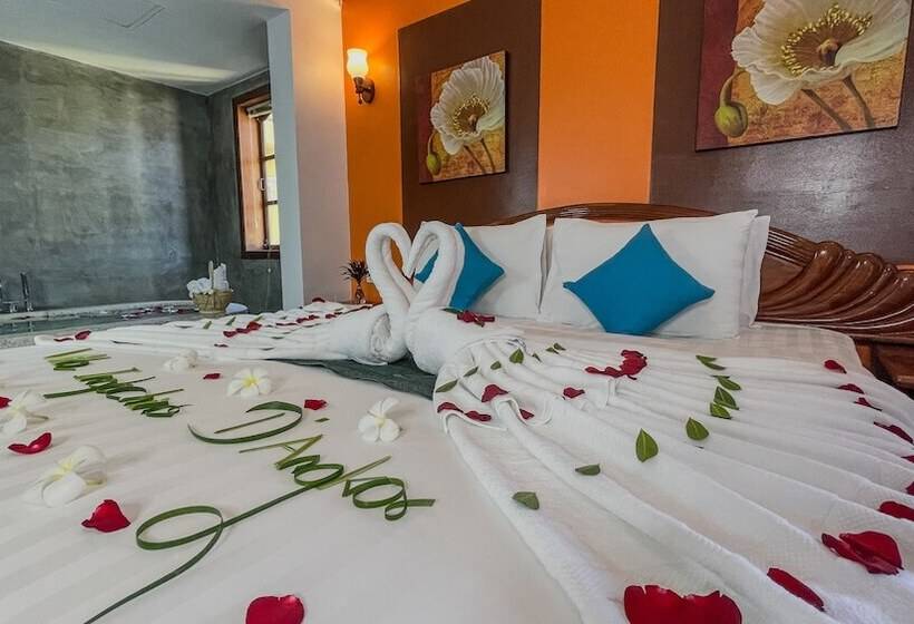 מיטת קינג בסוויטה, Villa Indochine D Angkor