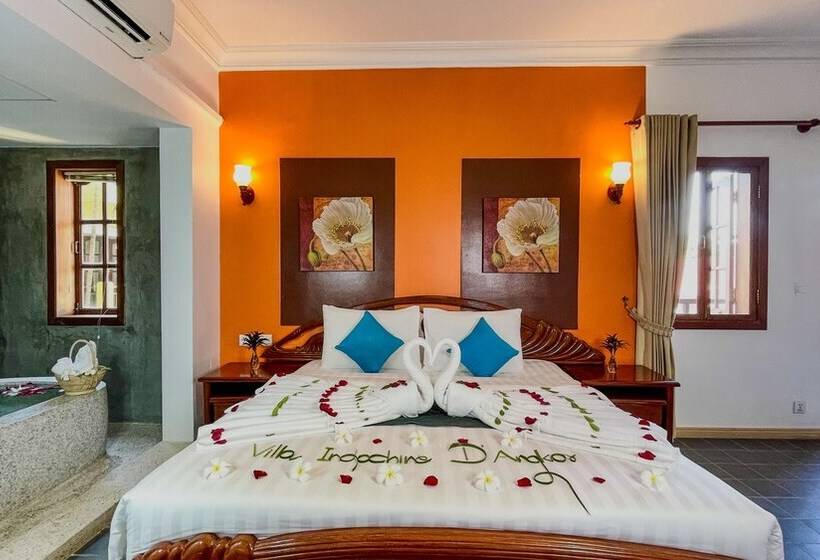 מיטת קינג בסוויטה, Villa Indochine D Angkor