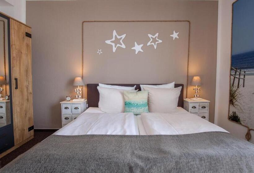 غرفة قياسية مطلّة علي البحر مزوَّدة بشُرفة, Akzent Strandhotels Seestern, Delphin & Lachs