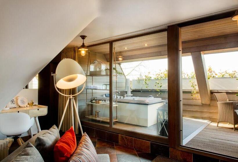 سوییت جونیور, Charmehotel Manoir Ogygia