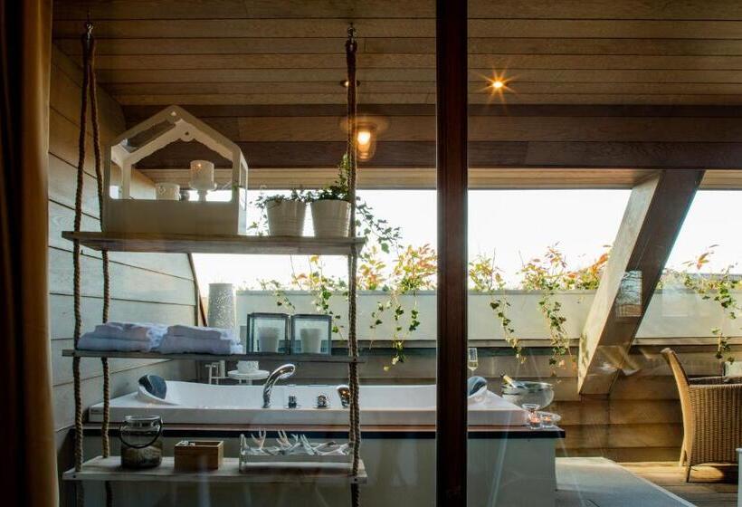 سوییت جونیور, Charmehotel Manoir Ogygia