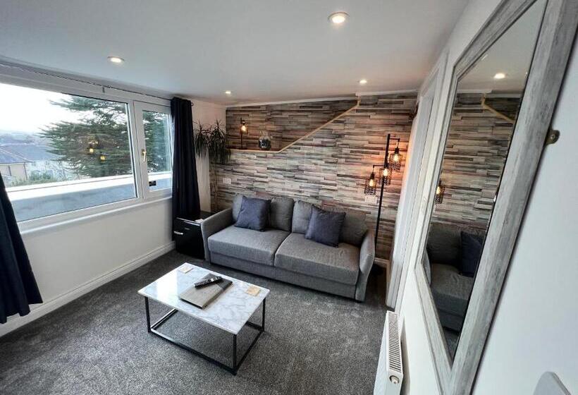 キングサイズベッドのデラックススイート, Coach Guest House