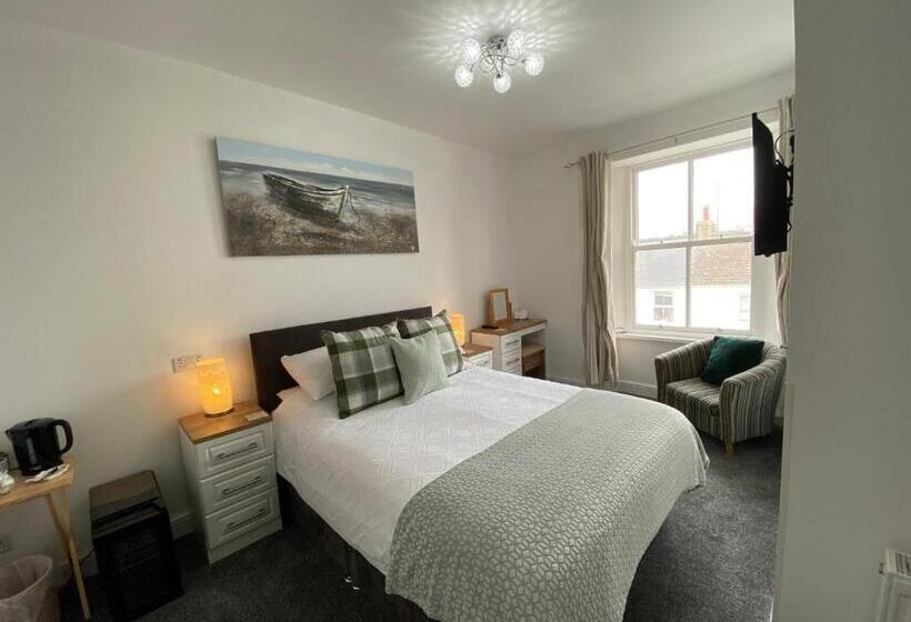 キングサイズベッドのデラックスルーム, Coach Guest House