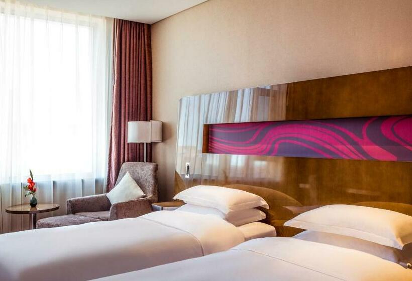 キングサイズベッドのデラックスルーム, Novotel Daqing Haofang