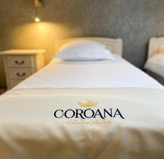 Номер Economy, Coroana