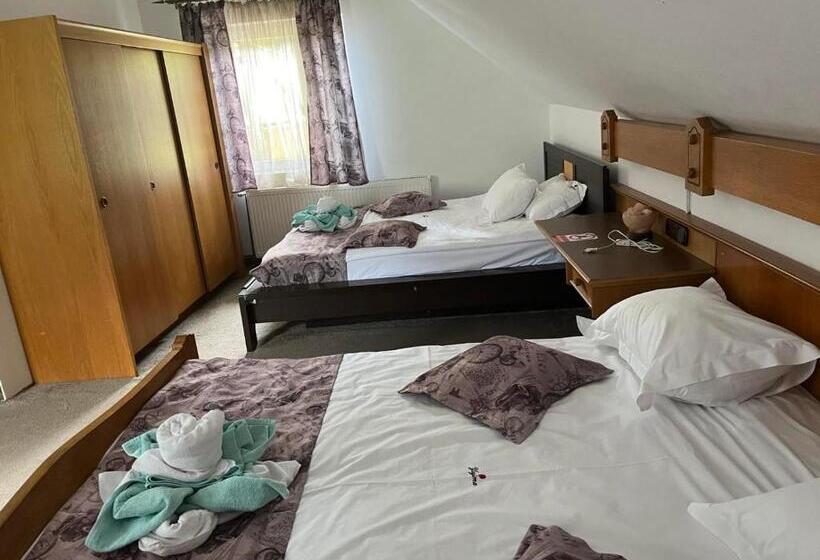 غرفة قياسية رباعية, Pensiunea Yajima