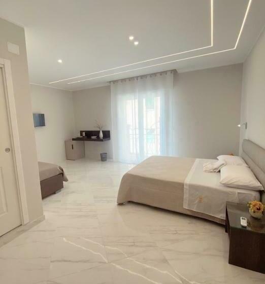 Quarto Quádruplo Estandar, Meligrana Central Rooms