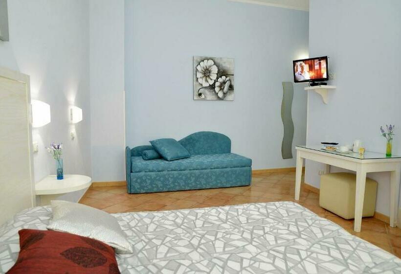 חדר לארבעה סטנדרטי עם מרפסת, Badia Rooms & Breakfast