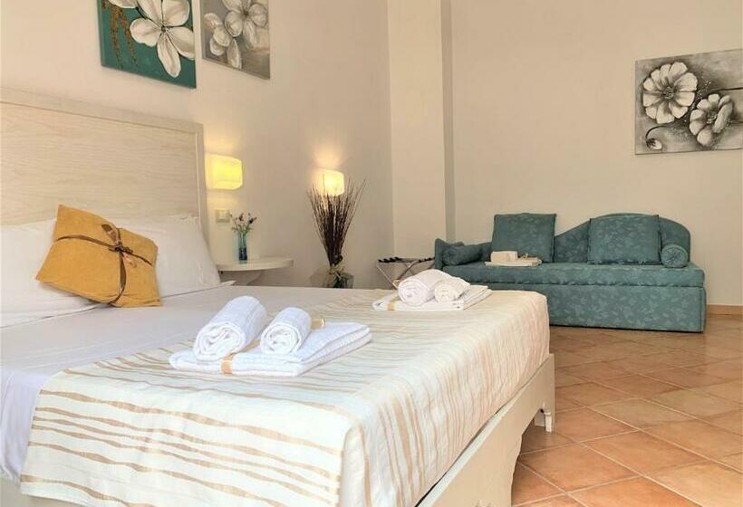 Quarto Quadruple Standart com Varanda, Badia Rooms & Breakfast