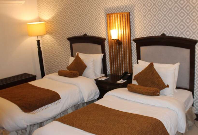 اتاق لوکس, Magnum Inn