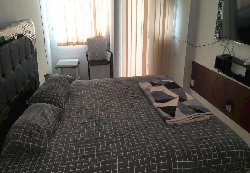 Номер Deluxe, Collection O 93386 Apartemen Grand Sentraland By Mira