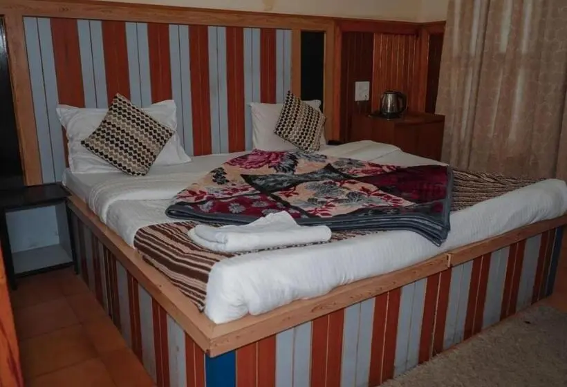キングサイズベッドのデラックスルーム, Himalaya Mount View Resort Uttarakhand