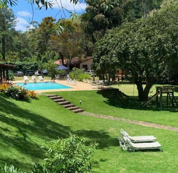 מיטת קינג בסוויטה, Recanto Da Paz Tur   Relax E Charme Na Serra