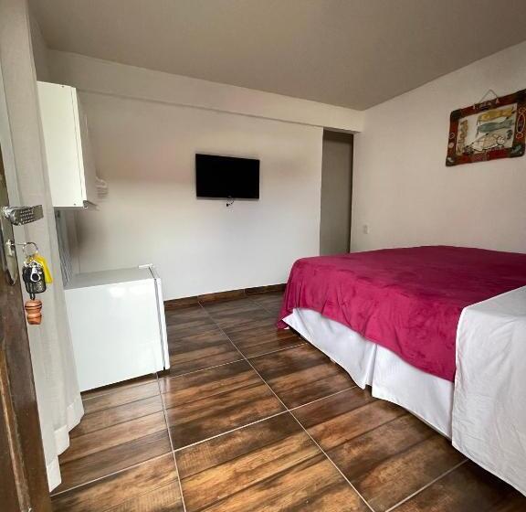 اتاق استاندارد سه تخته با چشم‌انداز باغ, Pousada Areias Do Pero