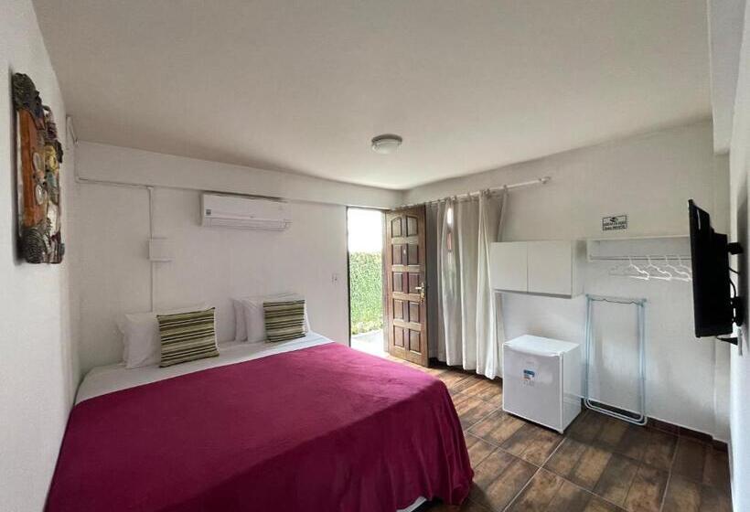 اتاق استاندارد سه تخته با چشم‌انداز باغ, Pousada Areias Do Pero