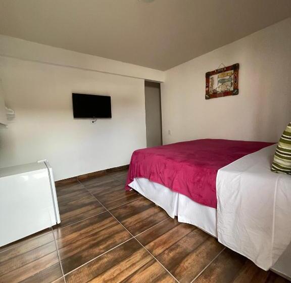 اتاق استاندارد سه تخته با چشم‌انداز باغ, Pousada Areias Do Pero