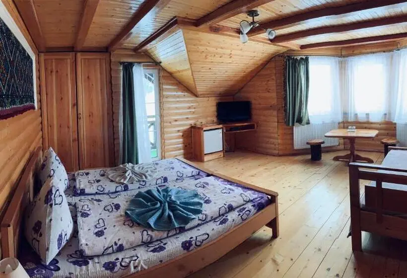Superior Kolmen Hengen Huone, Arnica